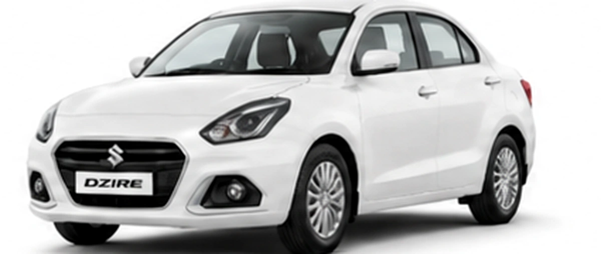 White Maruti Suzuki Dzire sedan